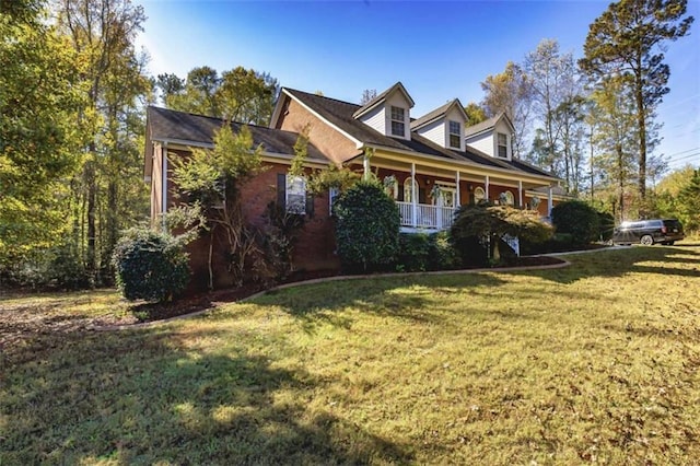 view of front facade with a porch and a front yard