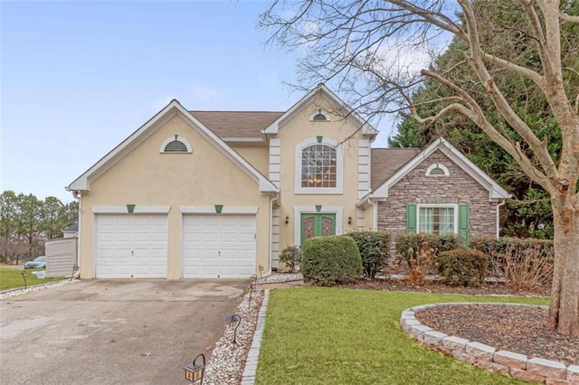 view of front of home featuring french doors and a front yard