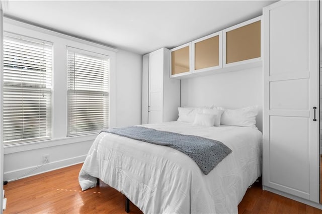 bedroom featuring hardwood / wood-style flooring