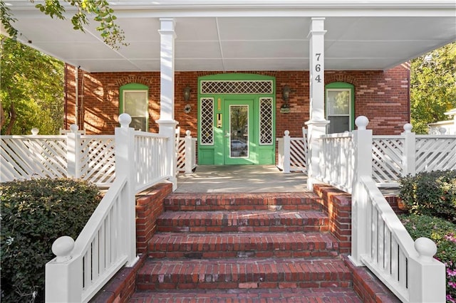 property entrance with a porch