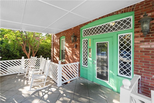 entrance to property with a porch