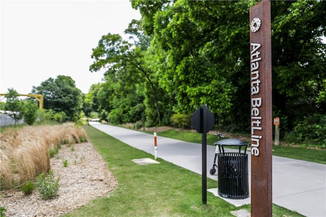 view of community featuring a lawn