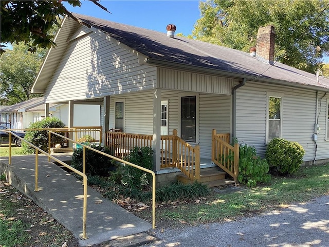 view of front of home featuring covered porch