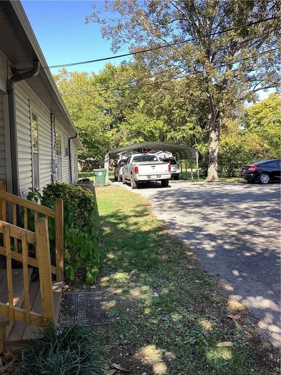 view of yard featuring a carport