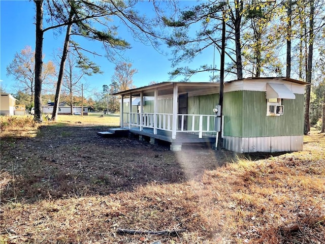 view of home's exterior with a porch