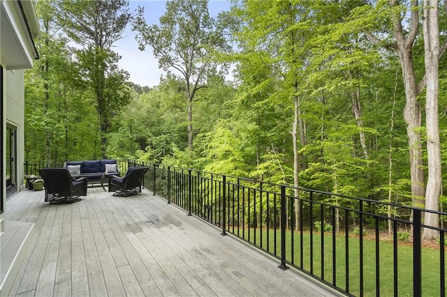 660 Willow Knoll Dr SE, Marietta, GA 30067 - wooden terrace with outdoor lounge area, a forest view, and a yard