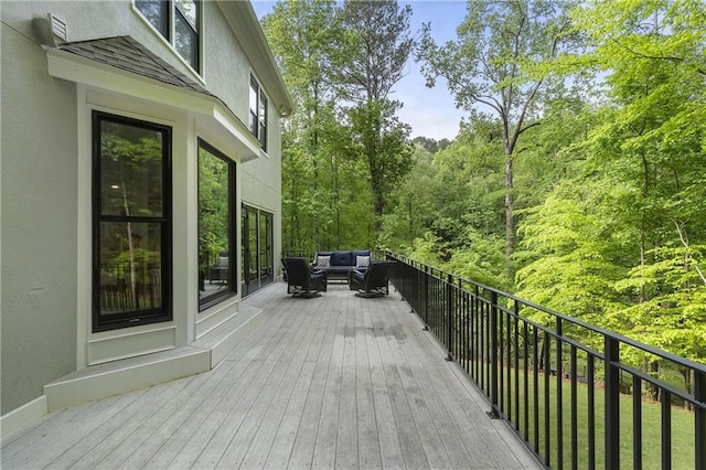 660 Willow Knoll Dr SE, Marietta, GA 30067 - deck featuring outdoor lounge area and a wooded view
