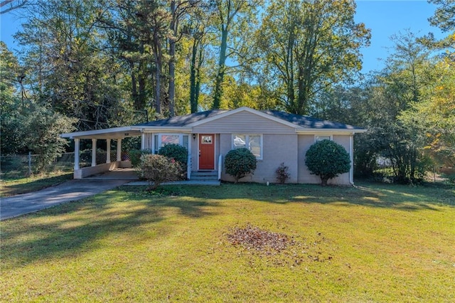 ranch-style house with a front yard and a carport