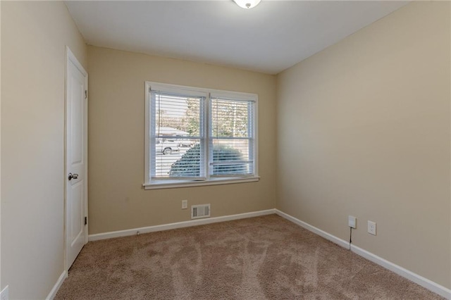 view of carpeted spare room