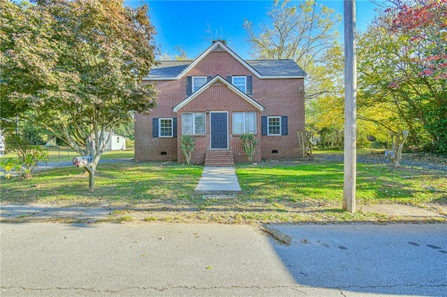 view of front of house with a front yard