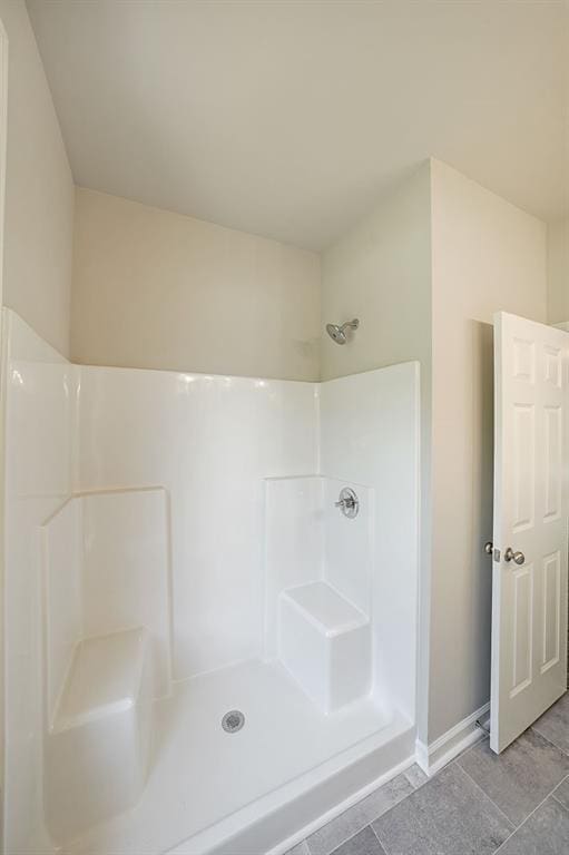 175 W Woods Dr, Dahlonega, GA 30533 - bathroom with a shower and baseboards