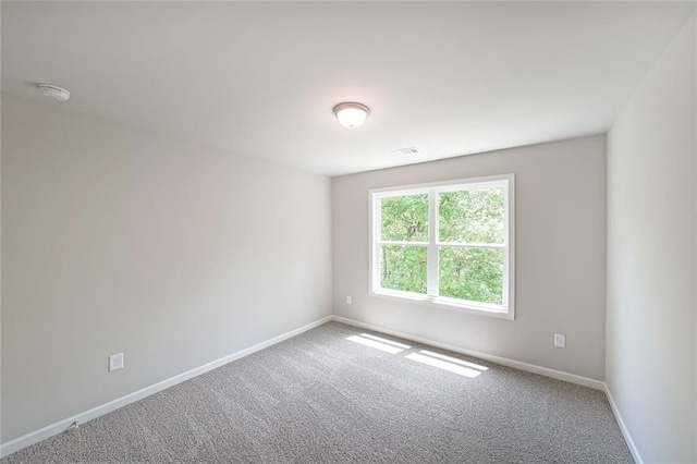 175 W Woods Dr, Dahlonega, GA 30533 - carpeted spare room with baseboards and a smoke detector