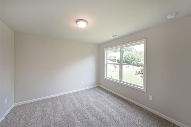 175 W Woods Dr, Dahlonega, GA 30533 - carpeted spare room featuring baseboards and a smoke detector