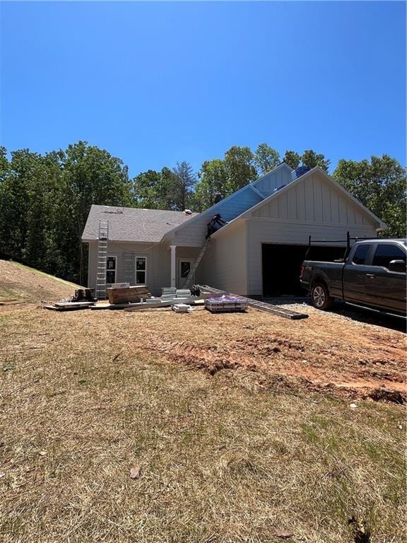 175 W Woods Dr, Dahlonega, GA 30533 - view of front facade with a garage