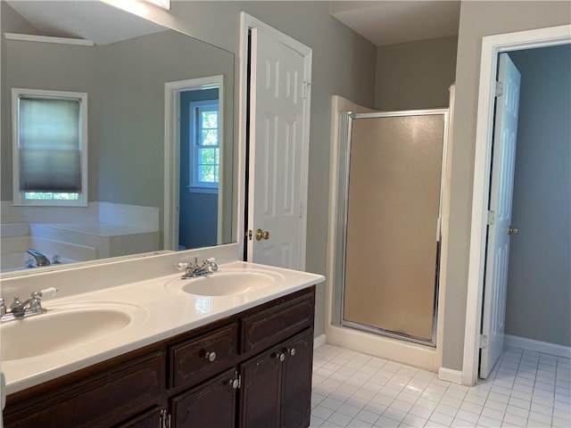 bathroom with vanity, separate shower and tub, and tile patterned flooring