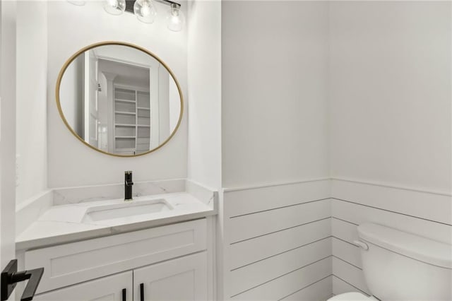 half bath with toilet and vanity