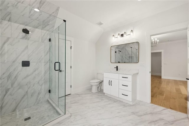 bathroom featuring a marble finish shower, baseboards, toilet, marble finish floor, and vanity