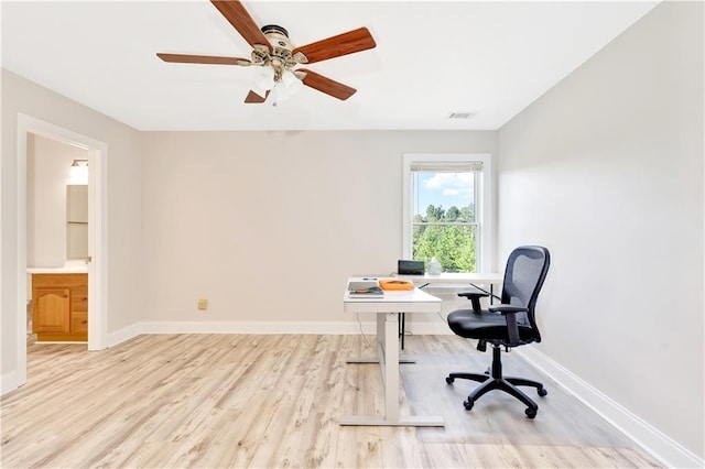 office area featuring light hardwood / wood-style floors and ceiling fan