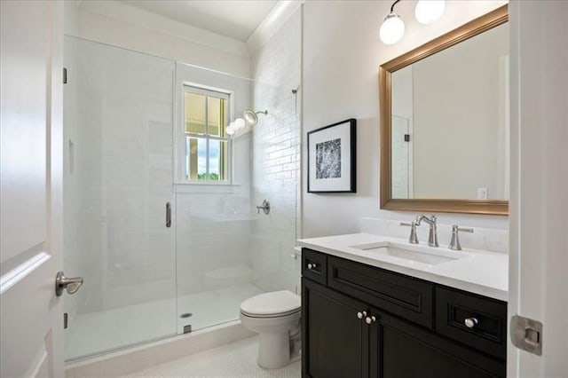 full bath with toilet, a stall shower, vanity, and tile patterned floors