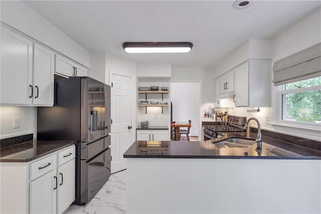 1867 N Creek Cir, Alpharetta, GA 30009 - kitchen with appliances with stainless steel finishes, open shelves, a peninsula, light marble finish flooring, and white cabinets