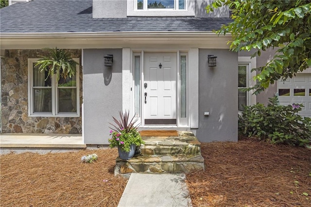 1867 N Creek Cir, Alpharetta, GA 30009 - doorway to property featuring a shingled roof, stone siding, and stucco siding