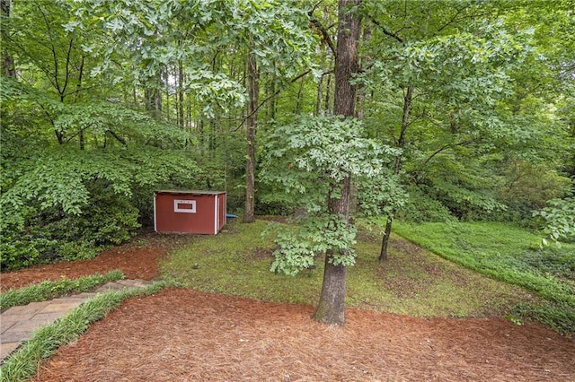 1867 N Creek Cir, Alpharetta, GA 30009 - view of yard featuring a wooded view