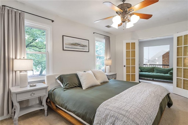 1867 N Creek Cir, Alpharetta, GA 30009 - bedroom featuring carpet floors, multiple windows, and ceiling fan
