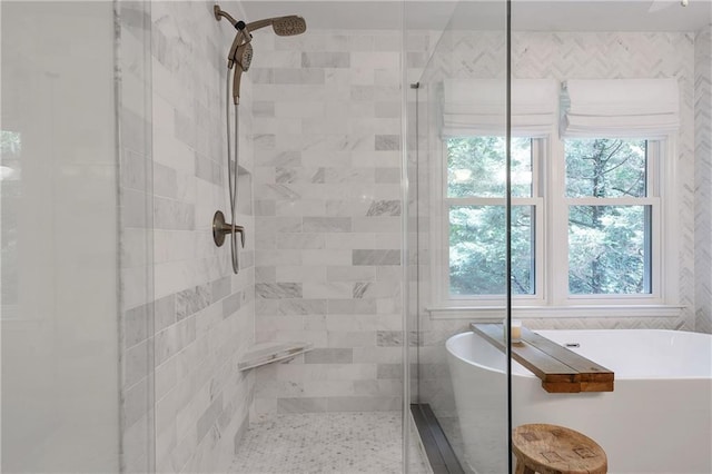 1867 N Creek Cir, Alpharetta, GA 30009 - full bathroom with a shower stall, healthy amount of natural light, a freestanding bath, and tile walls