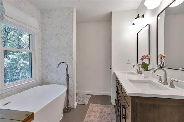 1867 N Creek Cir, Alpharetta, GA 30009 - full bath with a soaking tub, double vanity, baseboards, and tile patterned flooring