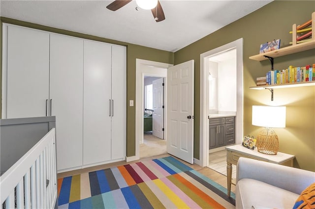 1867 N Creek Cir, Alpharetta, GA 30009 - bedroom with a closet, ensuite bathroom, and ceiling fan