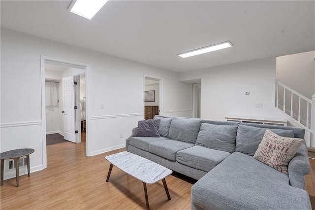 1867 N Creek Cir, Alpharetta, GA 30009 - living room featuring stairs, light wood finished floors, and baseboards
