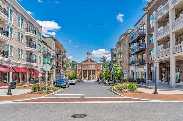 1867 N Creek Cir, Alpharetta, GA 30009 - view of asphalt road with street lighting, curbs, traffic signs, and sidewalks
