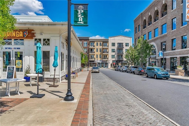 1867 N Creek Cir, Alpharetta, GA 30009 - view of asphalt road with sidewalks, street lights, and curbs