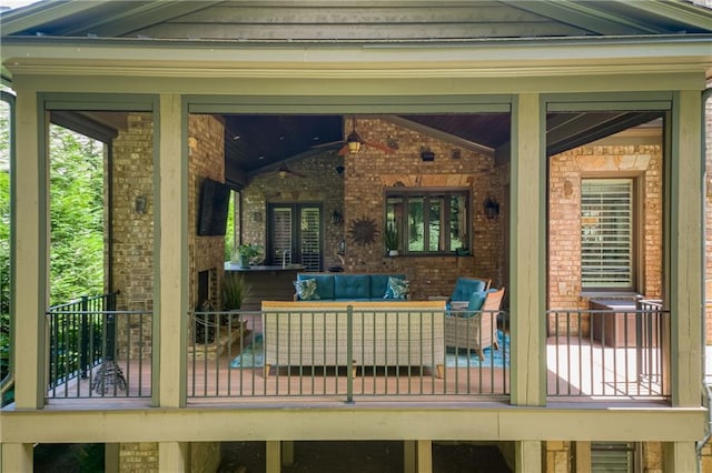 deck with an outdoor hangout area