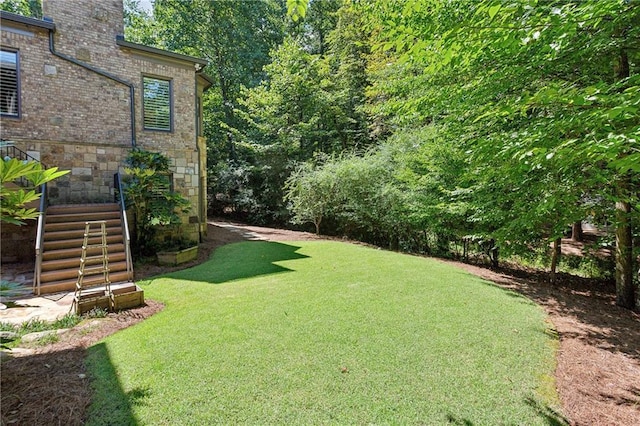 view of yard with stairs