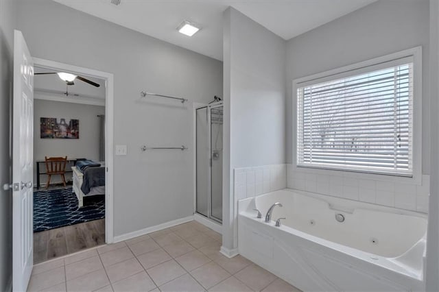 bathroom featuring tile patterned flooring and independent shower and bath