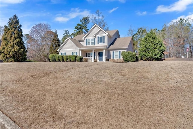 craftsman house featuring a front yard and a porch