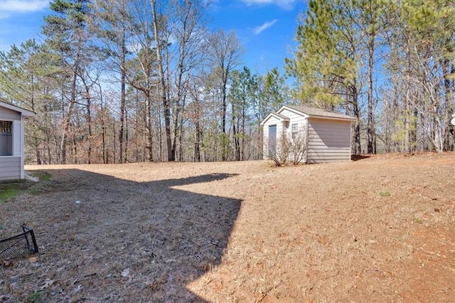 view of yard with a shed