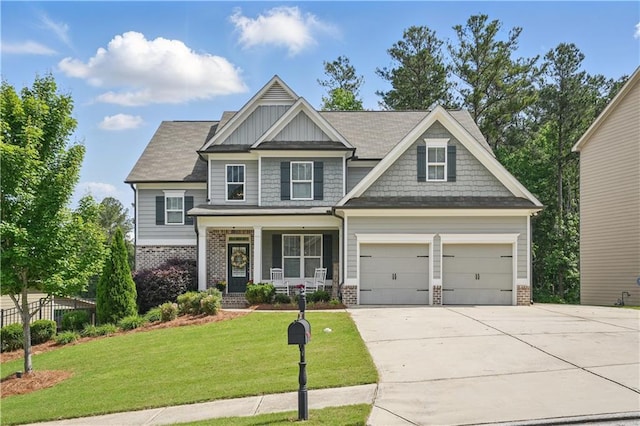 1255 Double Branches Ln, Dallas, GA 30132 - craftsman-style home with brick siding, covered porch, and concrete driveway
