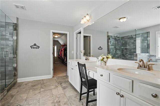 1255 Double Branches Ln, Dallas, GA 30132 - bathroom with a shower stall, double vanity, a walk in closet, and baseboards