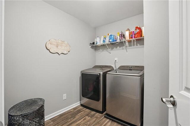 1255 Double Branches Ln, Dallas, GA 30132 - clothes washing area with washing machine and clothes dryer, dark wood finished floors, and baseboards
