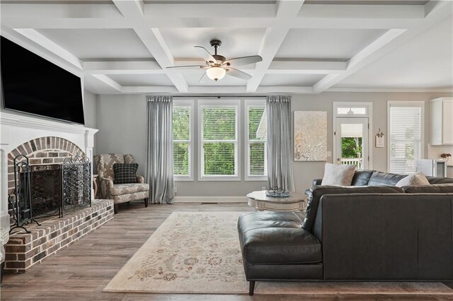 1255 Double Branches Ln, Dallas, GA 30132 - living area with a fireplace, wood finished floors, a ceiling fan, coffered ceiling, and beam ceiling