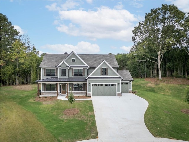 craftsman-style home featuring a front yard, a garage, and a porch