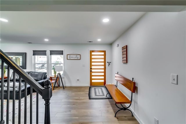 foyer with hardwood / wood-style floors