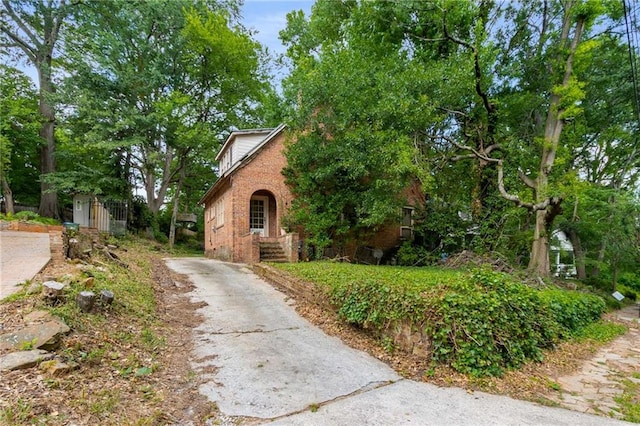 1200 Mansfield Ave NE, Atlanta, GA 30307 - view of front of property with brick siding and driveway