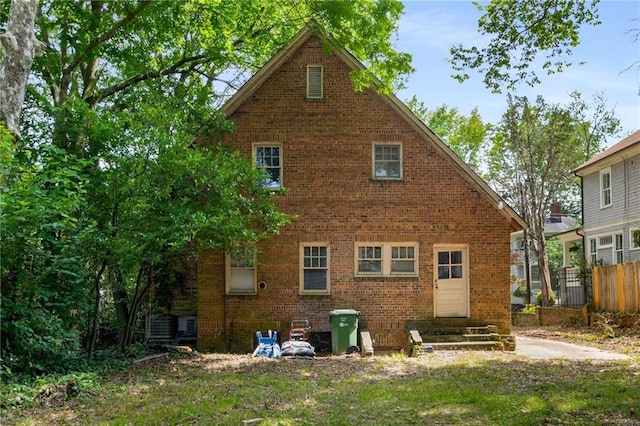 1200 Mansfield Ave NE, Atlanta, GA 30307 - back of property featuring brick siding and entry steps