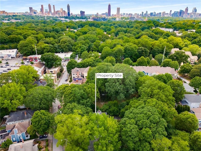 1200 Mansfield Ave NE, Atlanta, GA 30307 - aerial view of property and surrounding area featuring property boundaries highlighted and city skyline