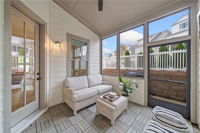 1010 Fendley St, Woodstock, GA 30188 - sunroom featuring vaulted ceiling, ceiling fan, and an outdoor living space