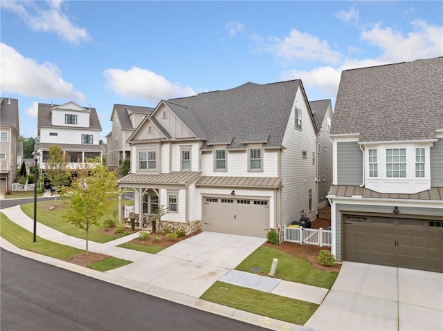 1010 Fendley St, Woodstock, GA 30188 - view of front of house with a garage, a standing seam roof, board and batten siding, concrete driveway, and a residential view