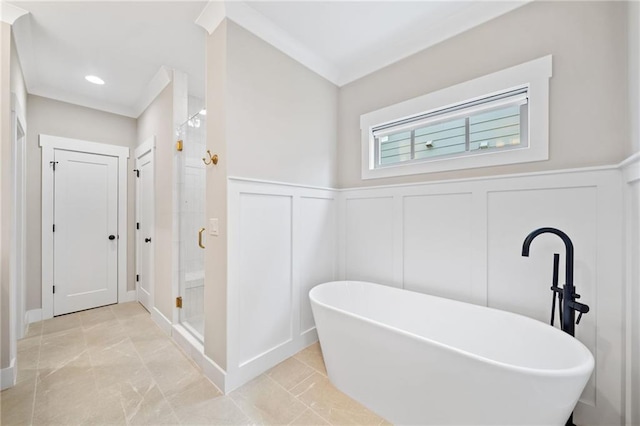 1010 Fendley St, Woodstock, GA 30188 - full bathroom featuring a decorative wall, a soaking tub, a shower stall, and wainscoting